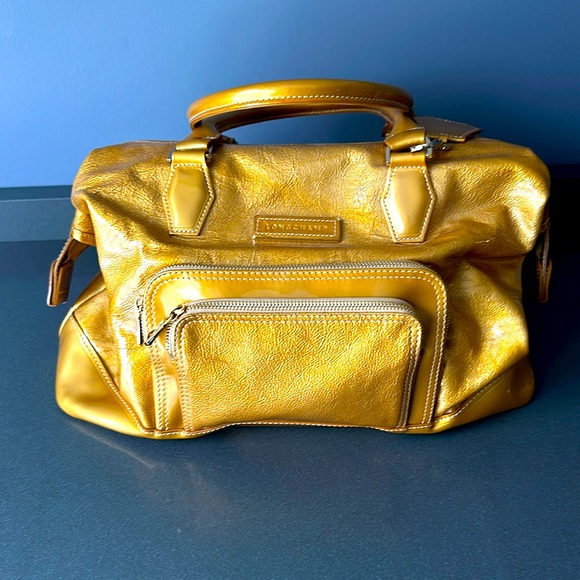 Longchamp Handbags - Longchamp Metallic Gold Travel Bag